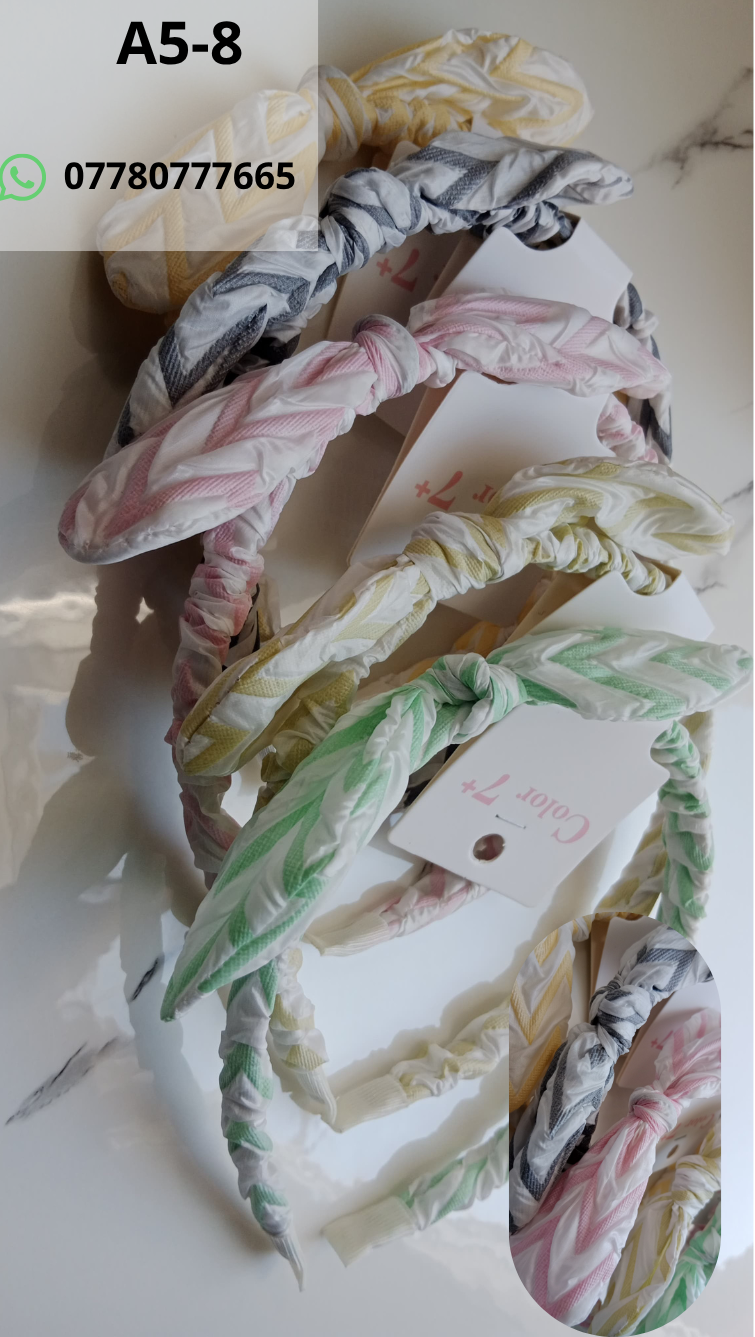 Hair Accessories Catalog A soft and stylish set of twisted knot headbands featuring comfortable pastel colors and a clean chevron pattern for an elegant everyday look.