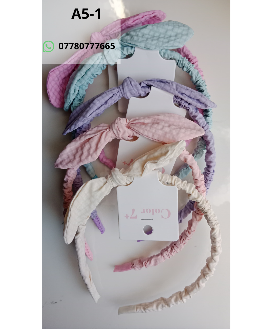 Hair Accessories Catalog A soft and elegant set of textured bow headbands designed in comfortable pastel colors, adding a fresh and feminine touch to everyday style.